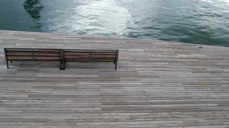 Person signing legal documents with lawyer